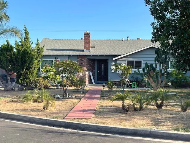 a front view of house with yard