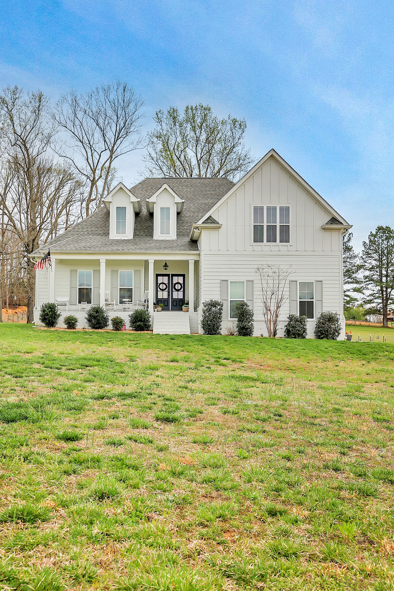 3190 Belotes Ferry Road Lebanon, TN 37087 - Photo 12 of 59 a front view of a house with a yard table and chairs