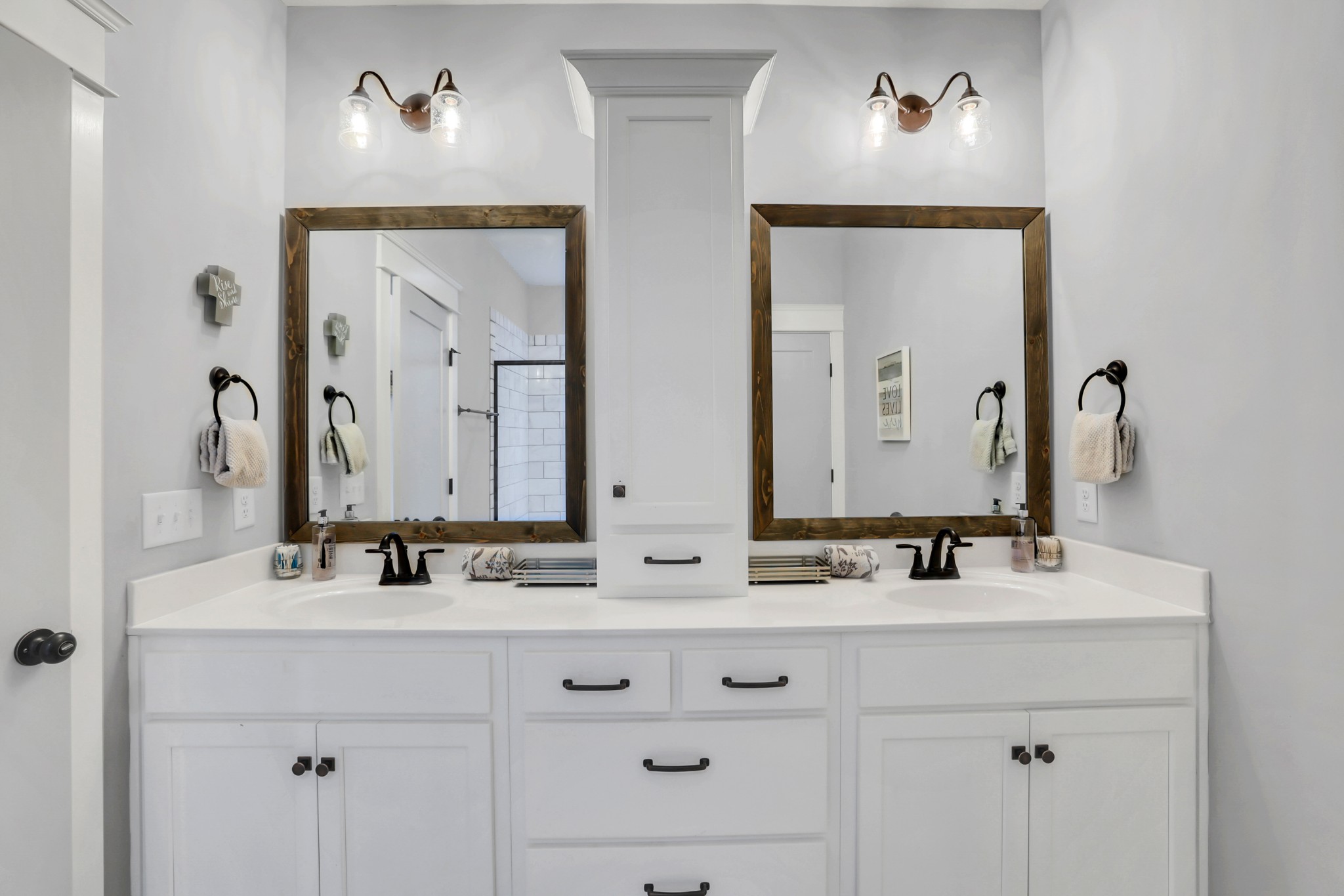 3190 Belotes Ferry Road Lebanon, TN 37087 - Photo 31 of 59 a bathroom with double vanity sinks and a mirror