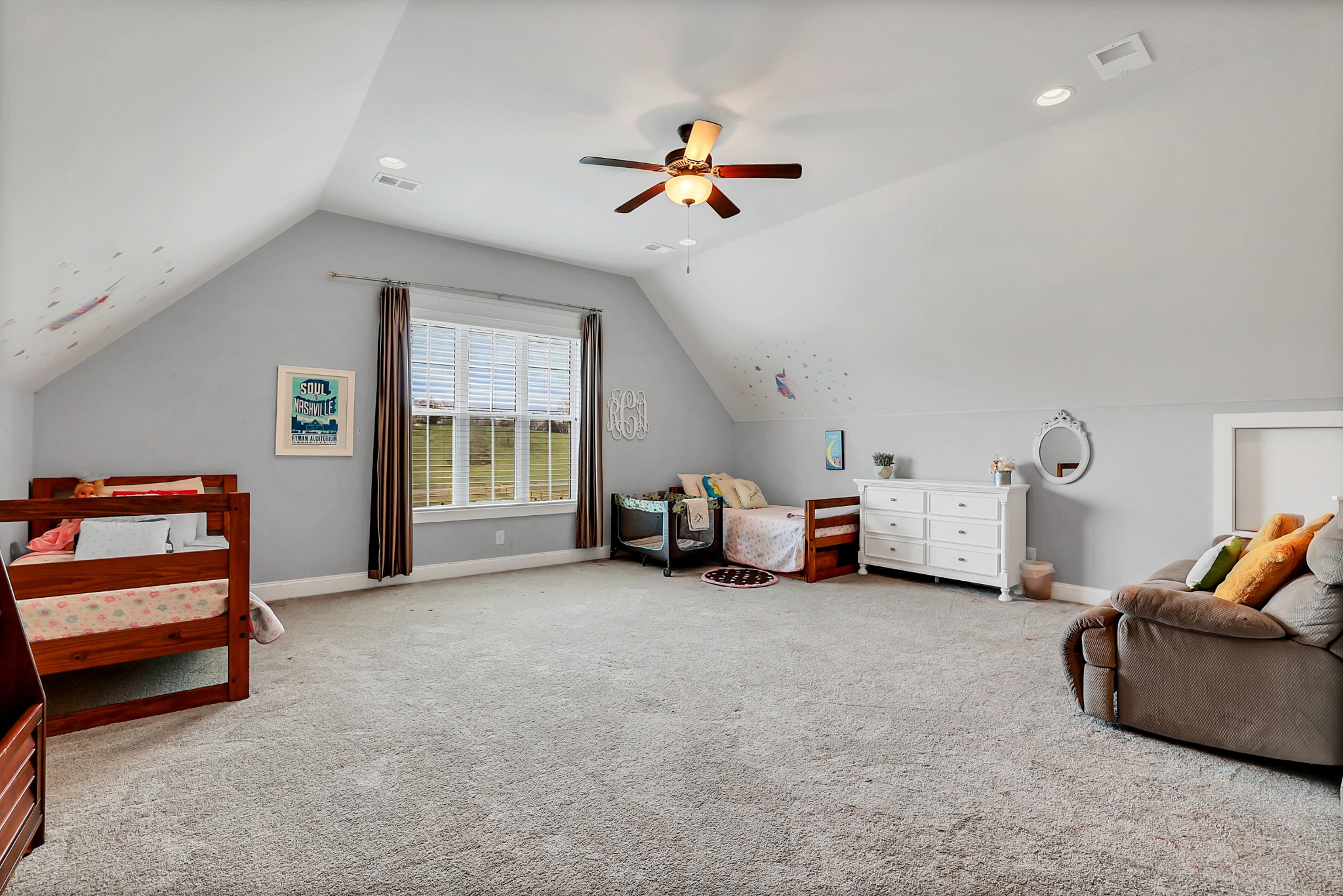 3190 Belotes Ferry Road Lebanon, TN 37087 - Photo 40 of 59 a view of a livingroom with furniture and a ceiling fan