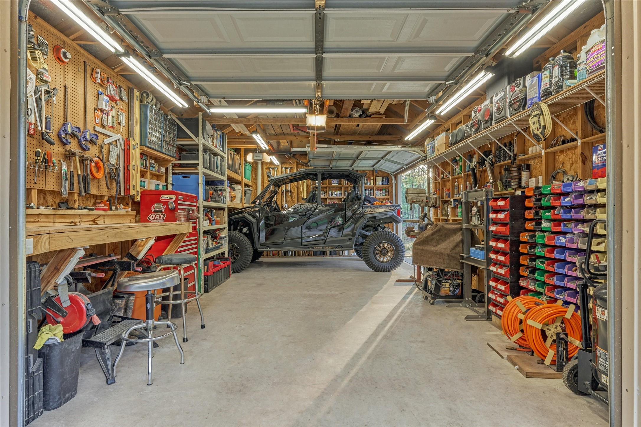 11598 Sebastian's Run Montgomery, TX 77316 - Photo 32 of 50 Expansive workshop space with abundant storage and workspace. Big enough for your ATV