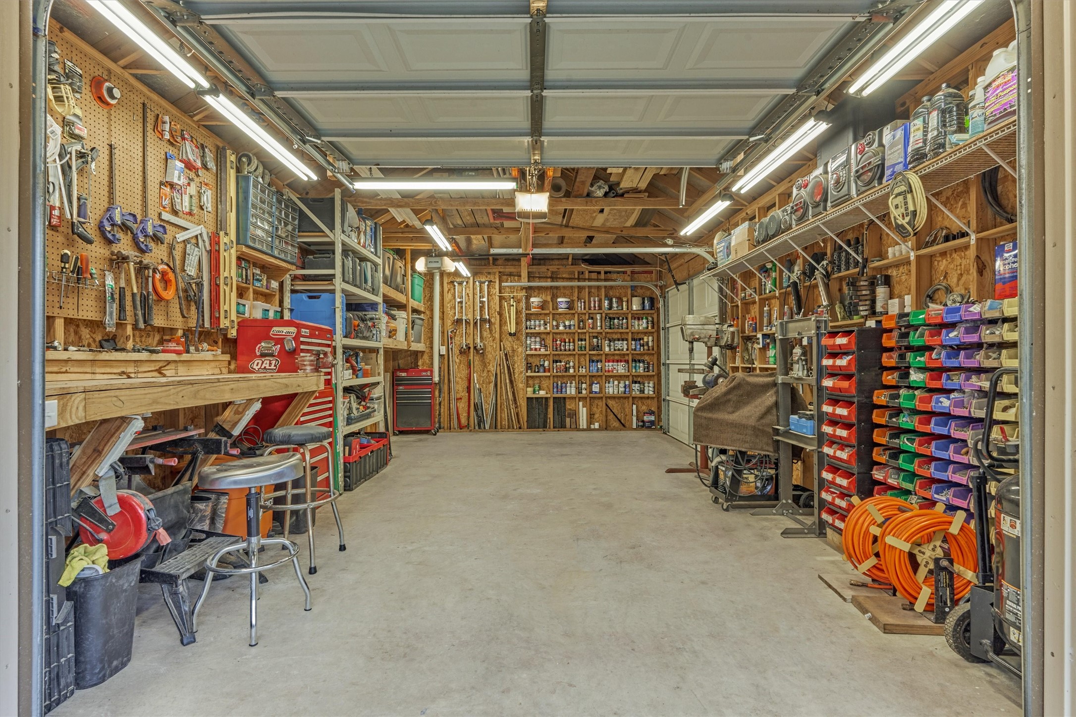 11598 Sebastian's Run Montgomery, TX 77316 - Photo 33 of 50 Workshop view highlighting organization and versatility.