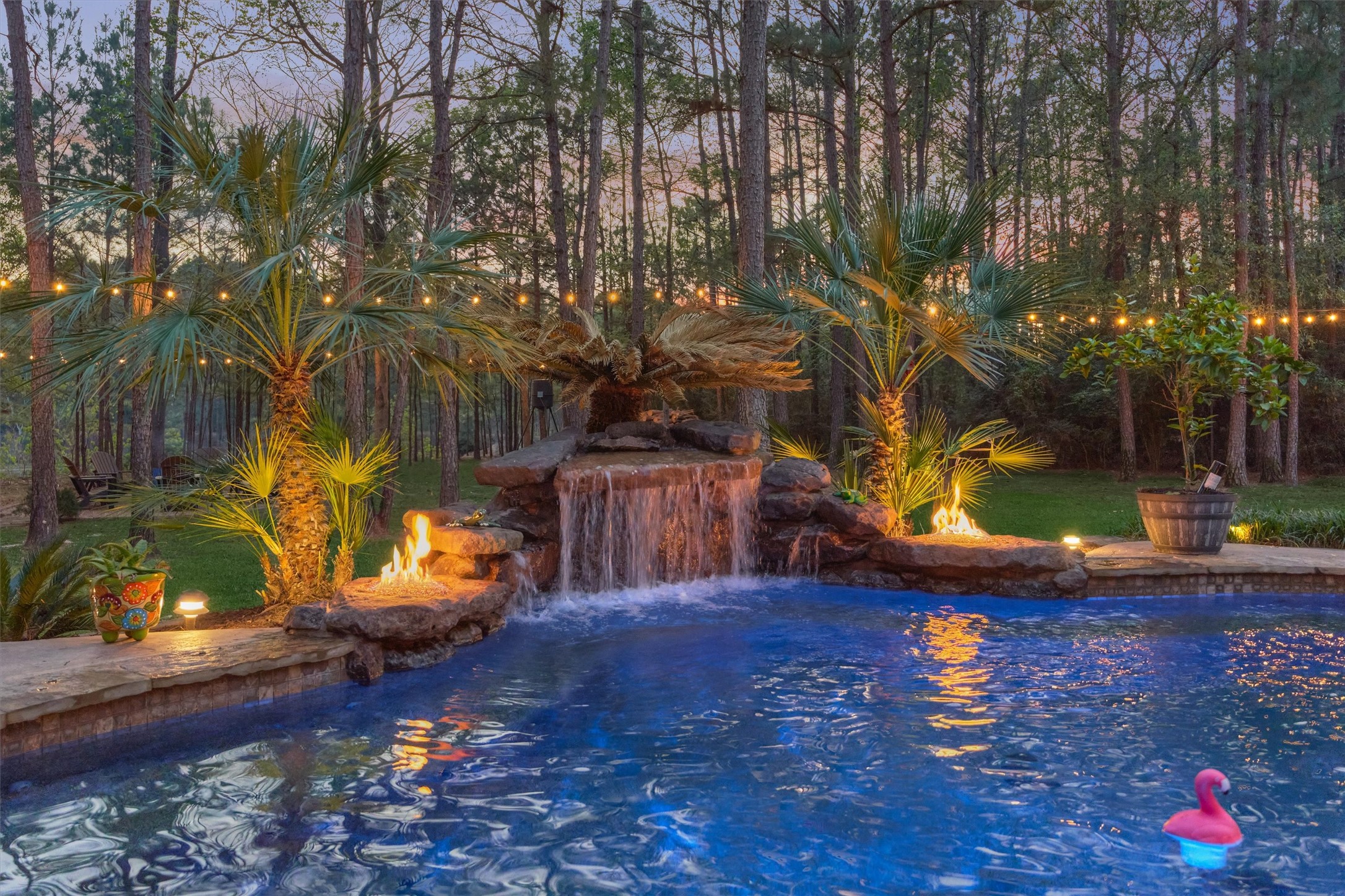11598 Sebastian's Run Montgomery, TX 77316 - Photo 9 of 50 Beautiful nighttime ambiance with pool lighting and gas fire bowls.