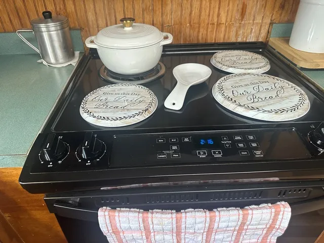 a bathroom with a toilet and a mirror