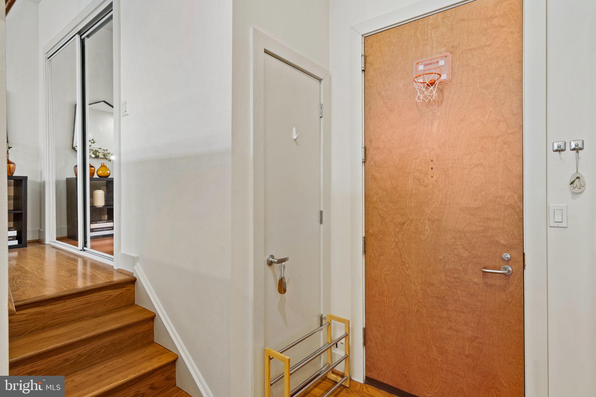 23 South 23rd Street, Unit 3D Philadelphia, PA 19103 - Photo 30 of 37 a view of a hallway with wooden floor and staircase