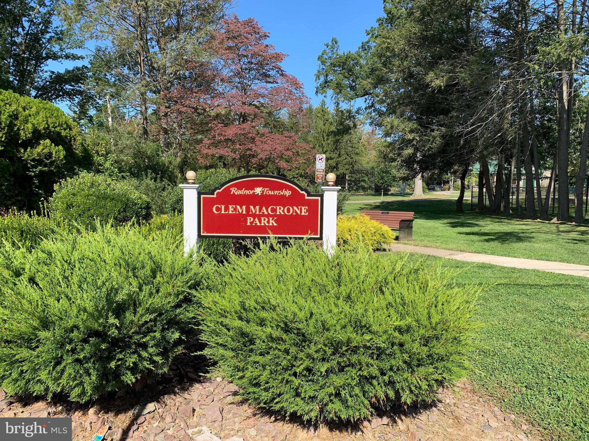 224 Rockingham Road Bryn Mawr, PA 19010 - Photo 22 of 23 a sign that is sitting in a yard with plants