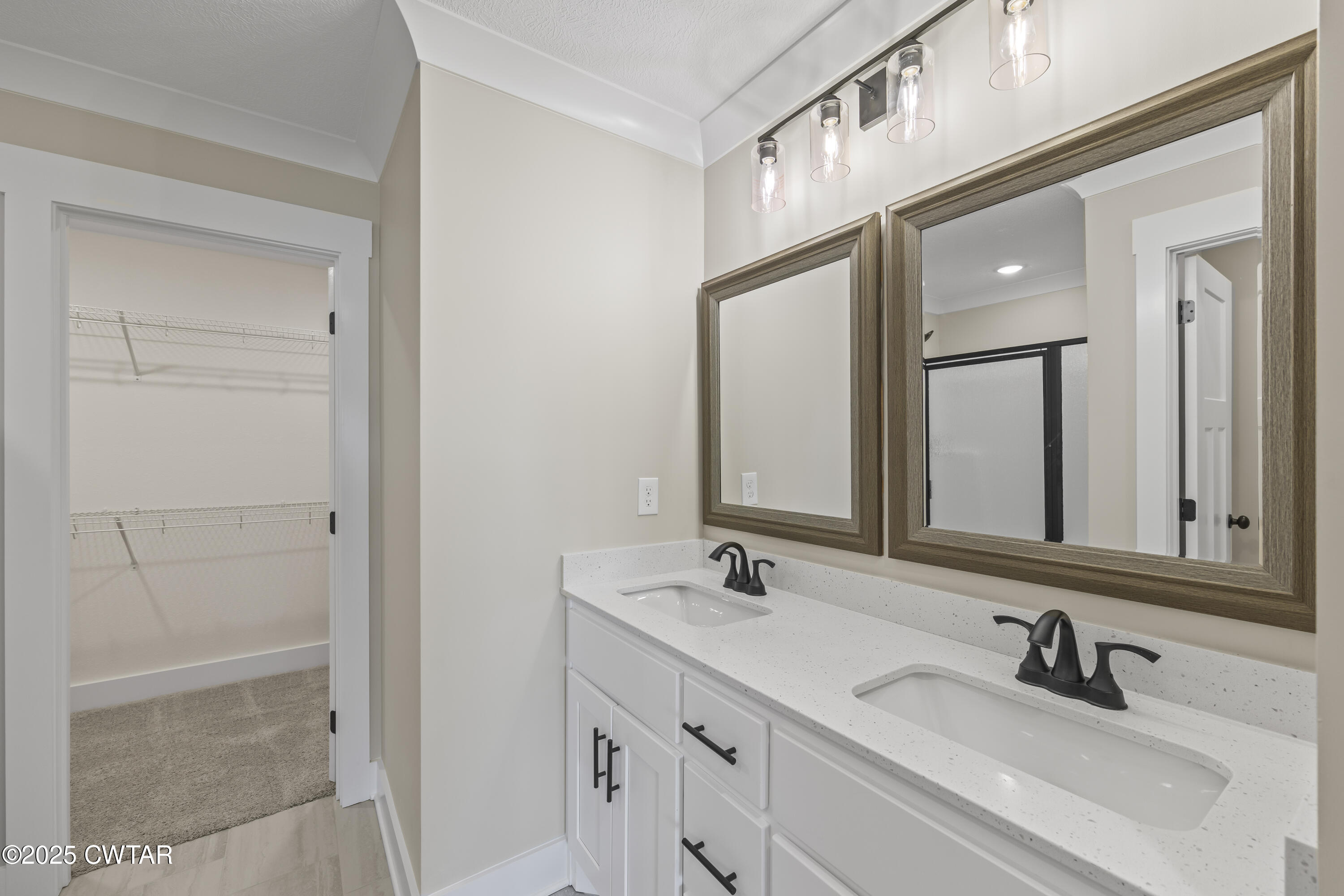 5 Easington Cove Jackson, TN 38305 - Photo 12 of 17 a bathroom with 2 sink and a mirror