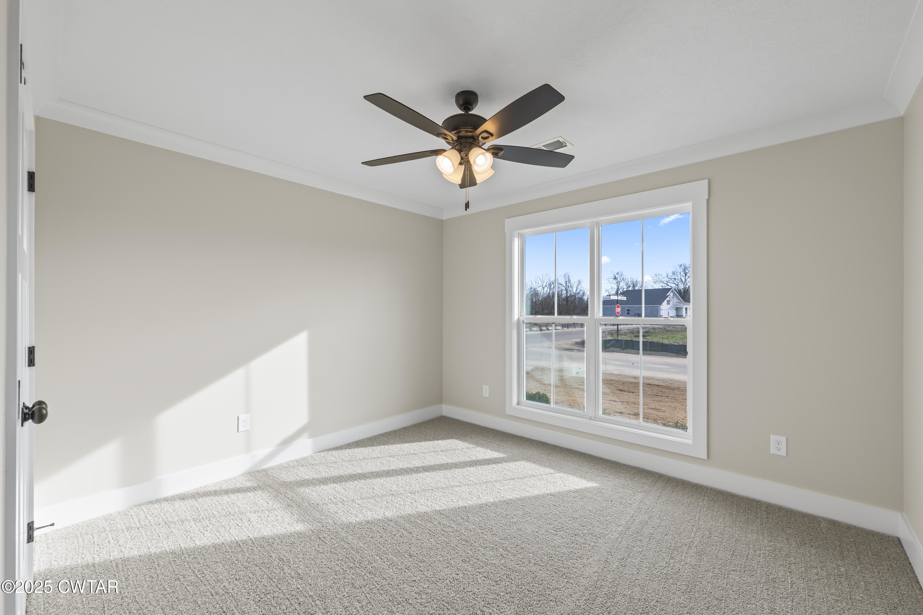 5 Easington Cove Jackson, TN 38305 - Photo 14 of 17 a view of an empty room with a window
