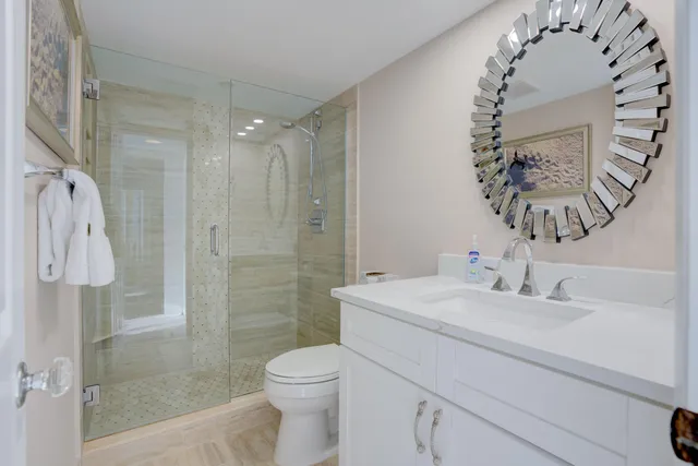 a bedroom with bed and tv