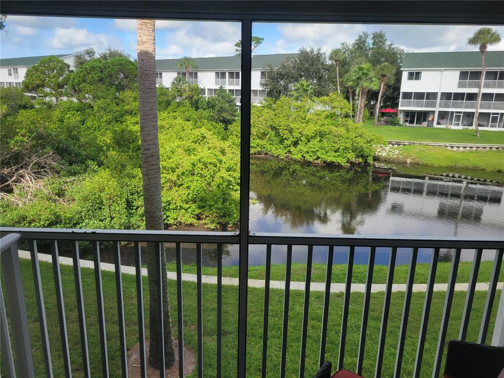9976 Indian Key Trail, Unit 7 Seminole, FL 33776 - Photo 5 of 16 a city view from a balcony