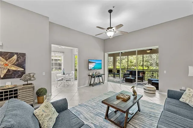 a dining room with a table and chairs