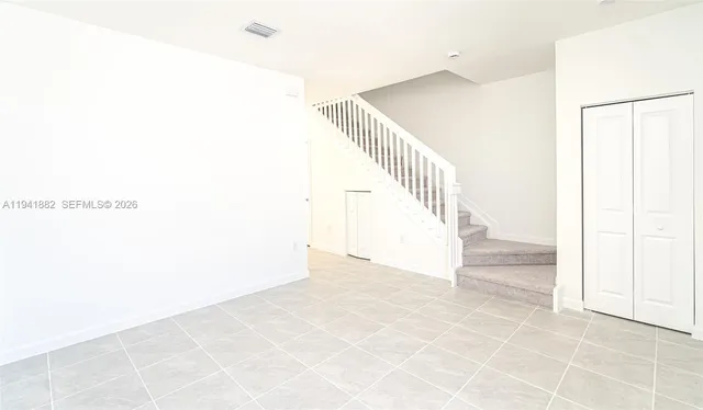 a view of an entryway with staircase