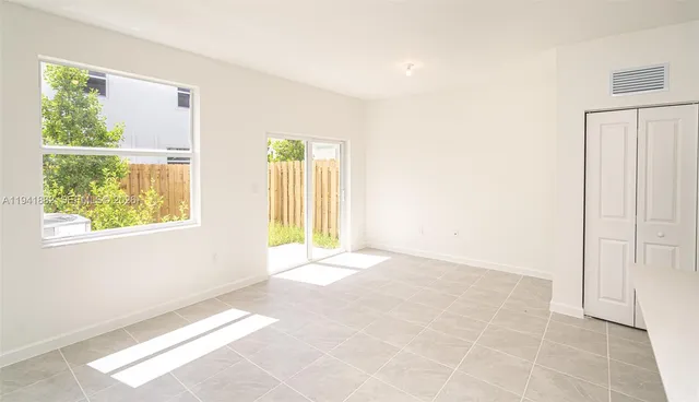 a kitchen with a sink and a window