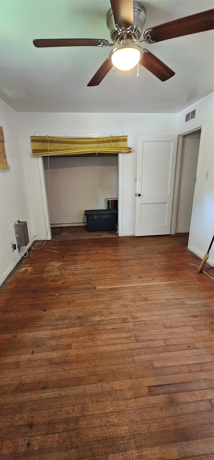 5703 Belneath Street Houston, TX 77033 - Photo 11 of 21 a view of empty room with wooden floor