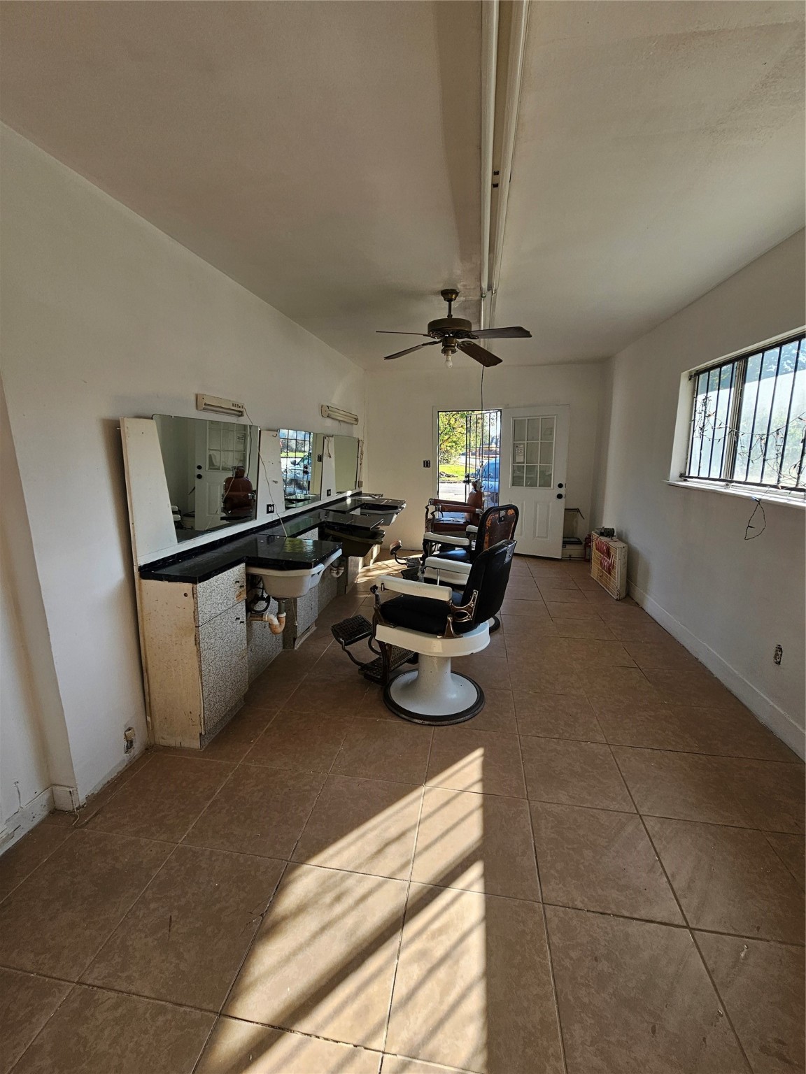 5703 Belneath Street Houston, TX 77033 - Photo 13 of 21 a view of a livingroom with furniture and windows