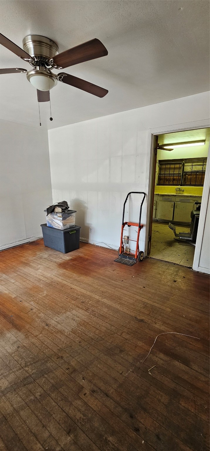 5703 Belneath Street Houston, TX 77033 - Photo 5 of 21 a room with storage and utility