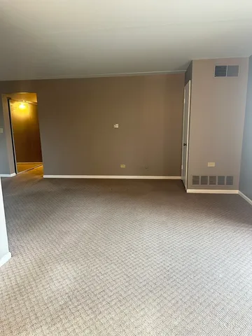 an empty room with window