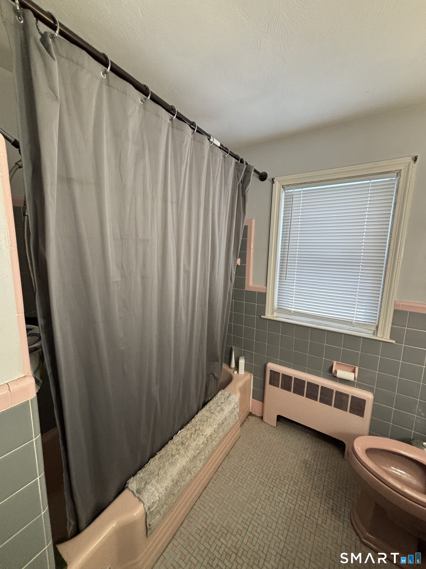 519 Prospect Street Wethersfield, CT 06109 - Photo 14 of 24 a bathroom with a sink and a bathtub
