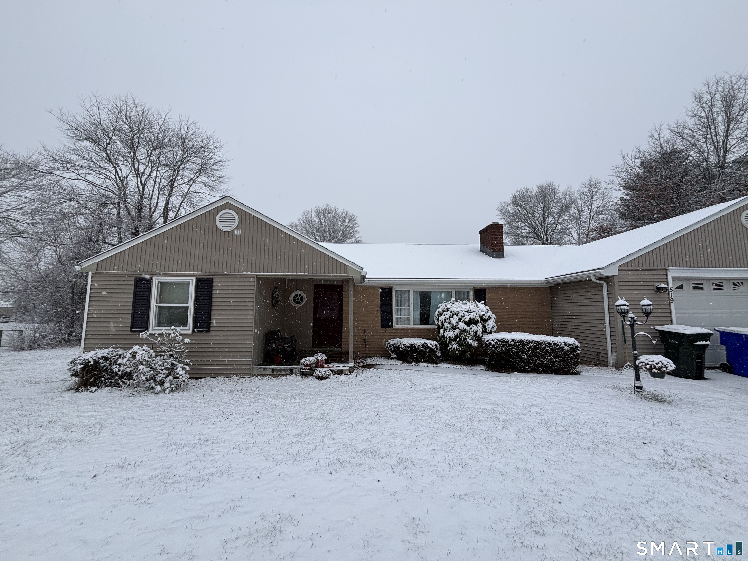 519 Prospect Street Wethersfield, CT 06109 - Photo 2 of 24 a view of a car park in front of house