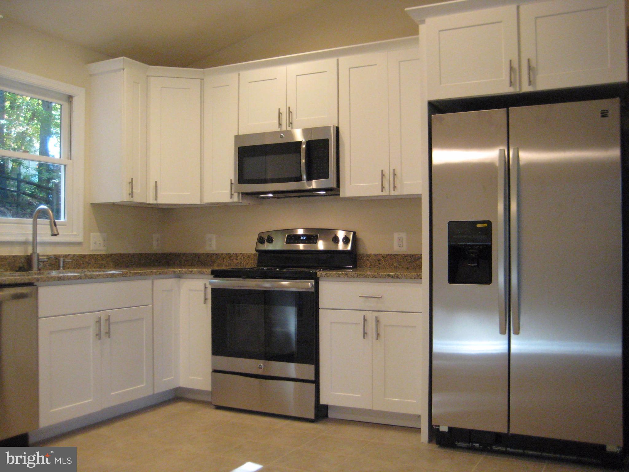 6725 Hemlock Point Road New Market, MD 21774 - Photo 3 of 16 DESIGNER KITCHEN CABINETRY AND GRANITE