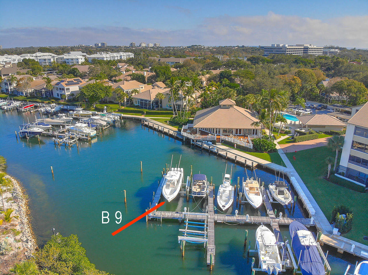 B-9 Oak Harbour Drive Juno Beach, FL 33408 - Photo 2 of 14 aerial view of a house with a lake view