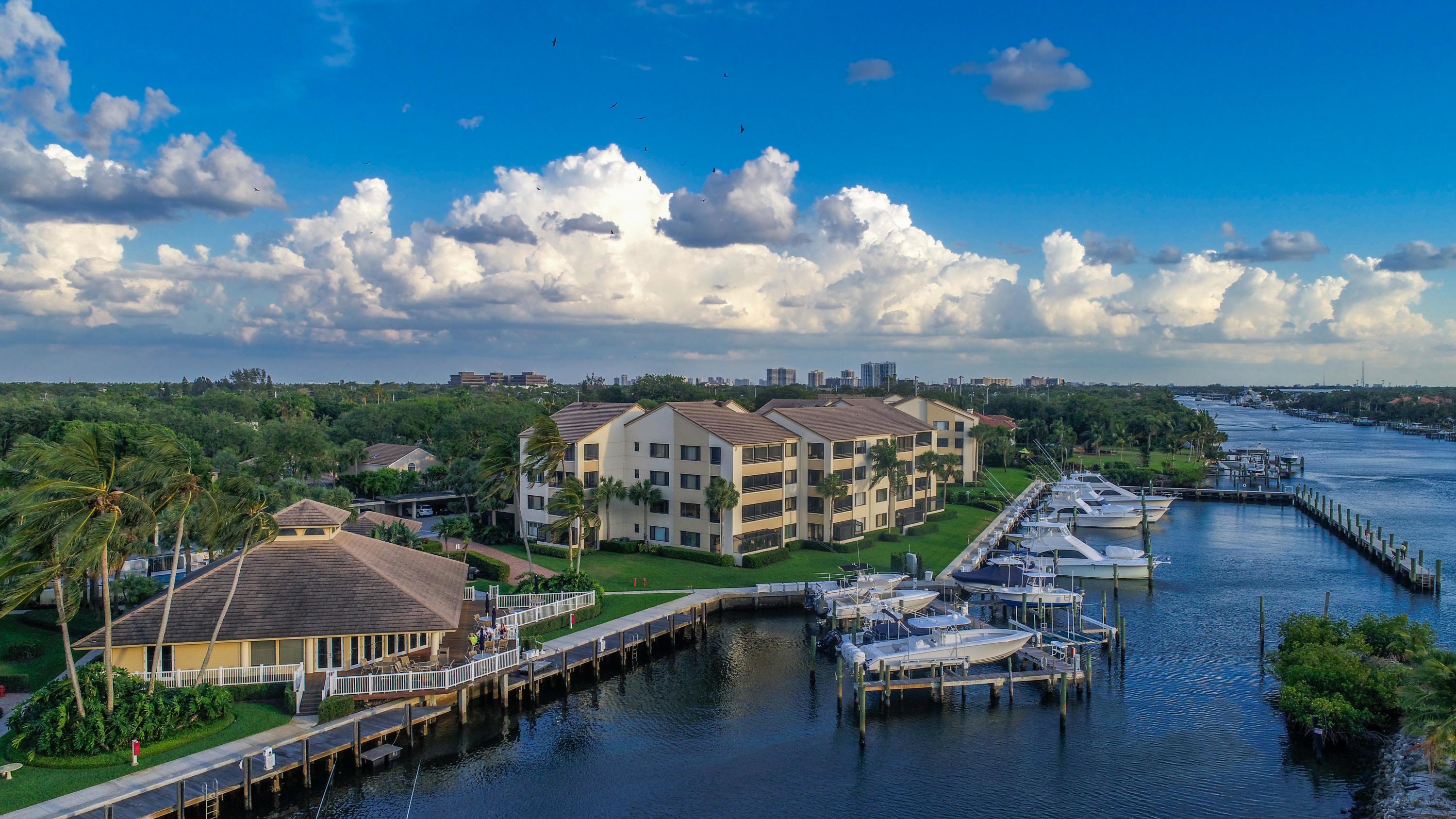 B-9 Oak Harbour Drive Juno Beach, FL 33408 - Photo 11 of 14 a view of a lake in middle of the town