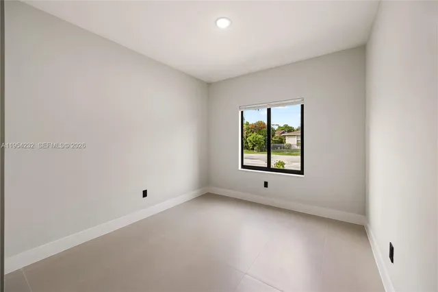 an empty room with a window