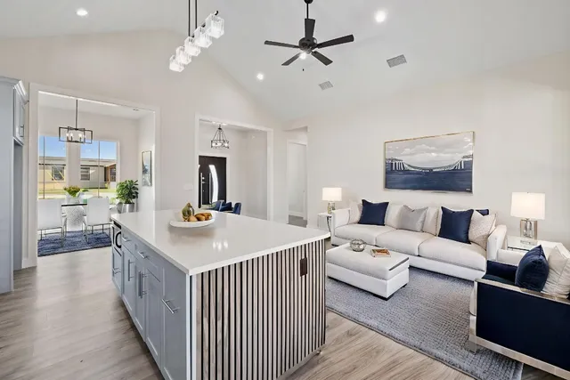 a living room with furniture and a table