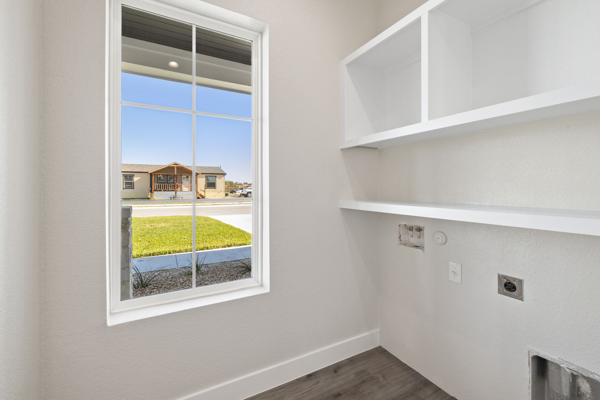 210 Jacaranda Drive Dale, TX 78616 - Photo 17 of 37 a view of an entryway with wooden floor