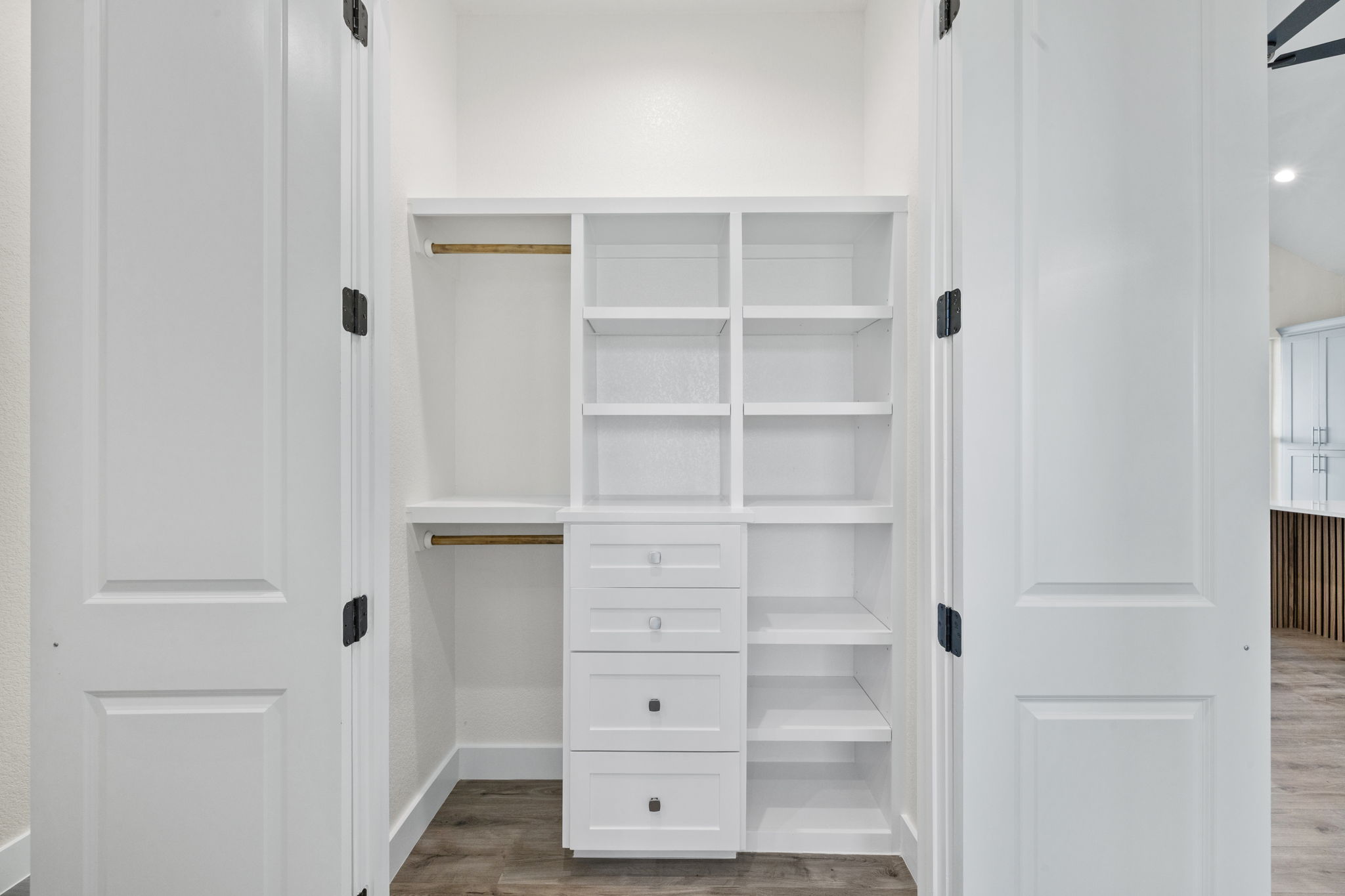 210 Jacaranda Drive Dale, TX 78616 - Photo 18 of 37 a view of walk in closet with empty racks