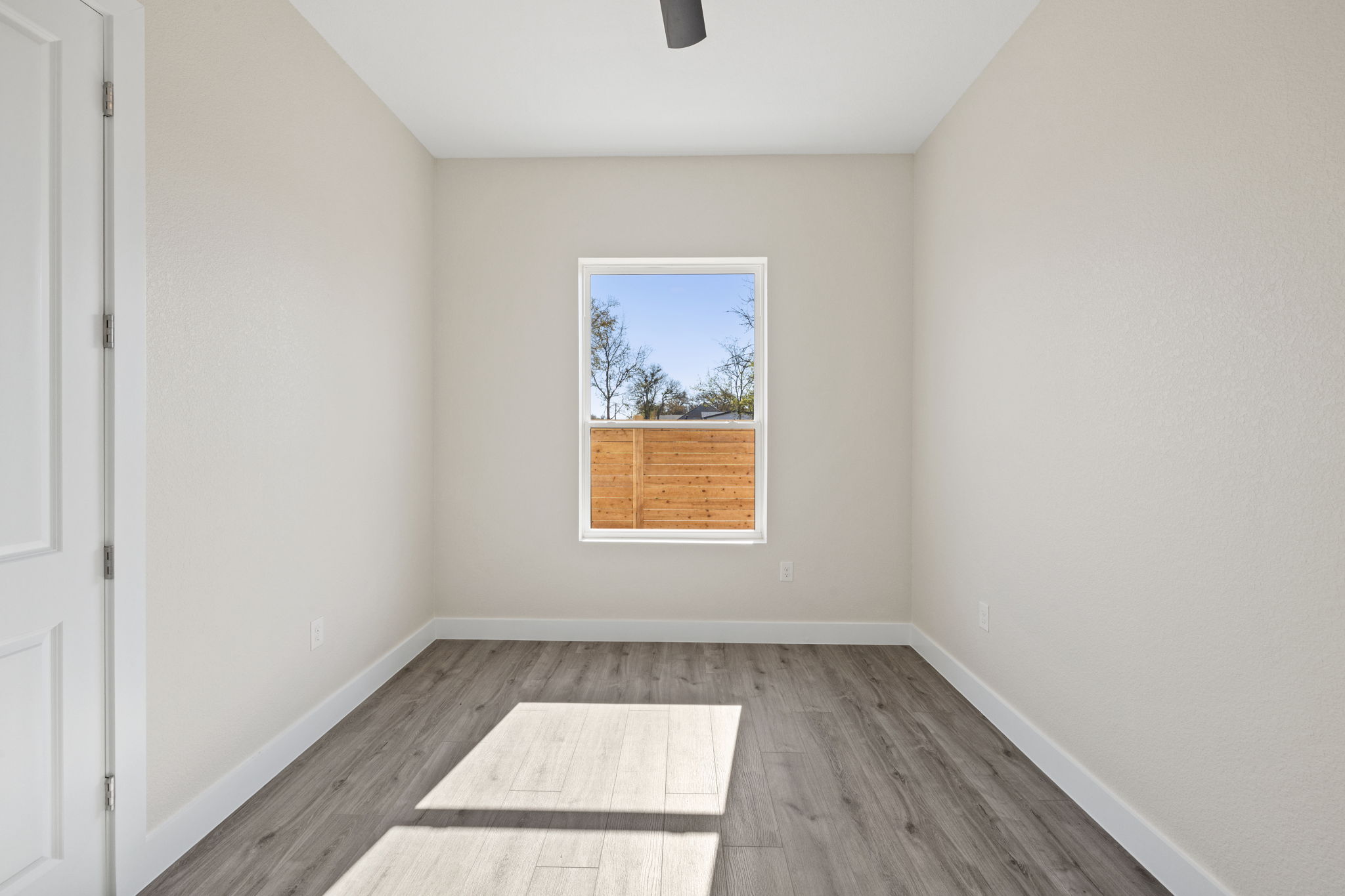 210 Jacaranda Drive Dale, TX 78616 - Photo 23 of 37 an empty room with a window