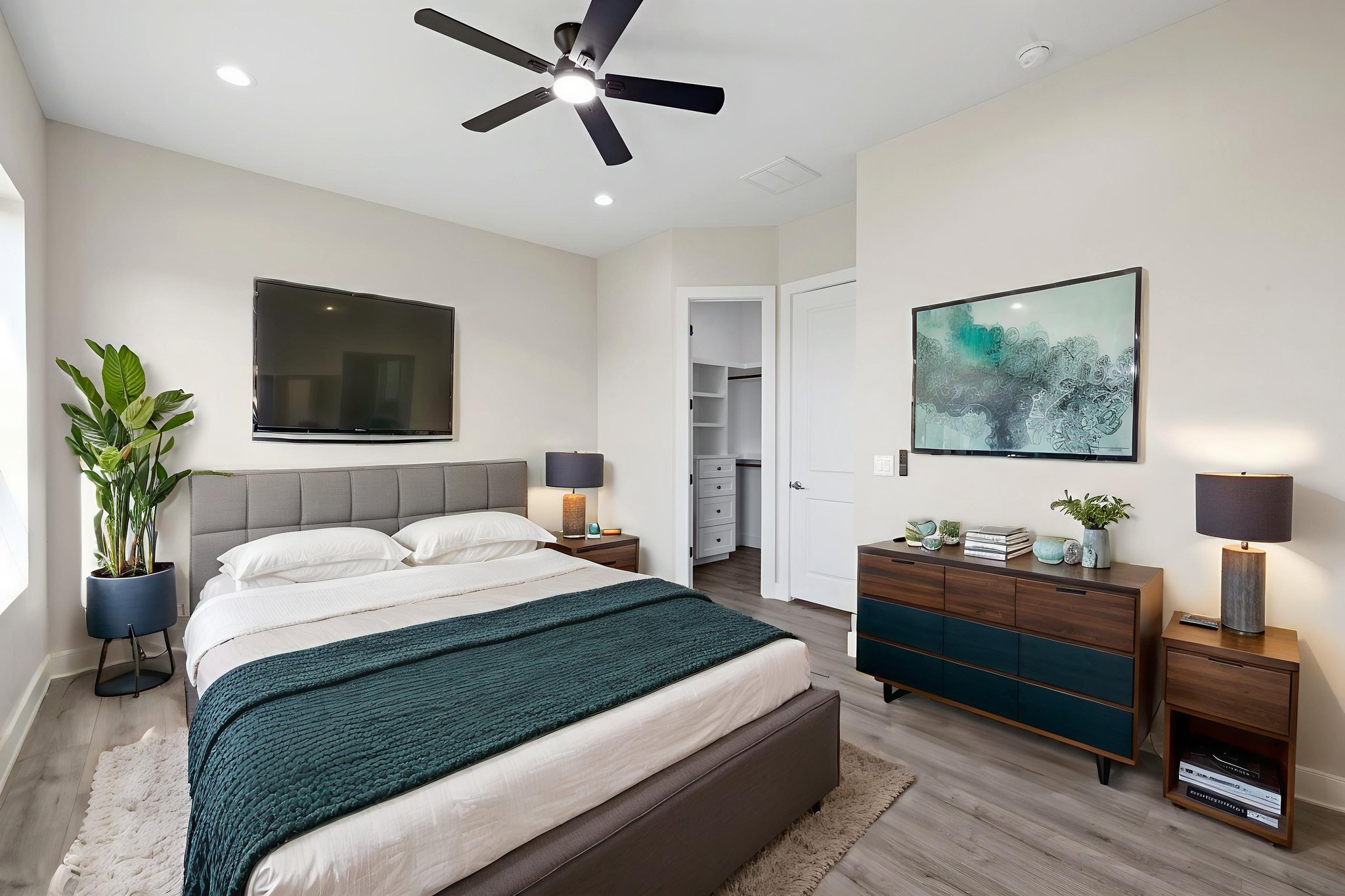 210 Jacaranda Drive Dale, TX 78616 - Photo 30 of 37 a bedroom with a bed and a flat screen tv