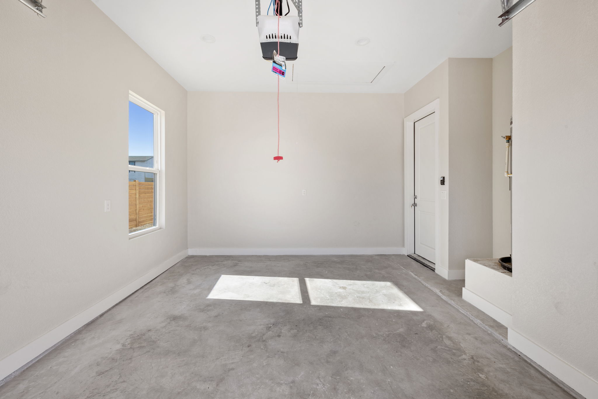 210 Jacaranda Drive Dale, TX 78616 - Photo 33 of 37 wooden floor in an empty room with a window