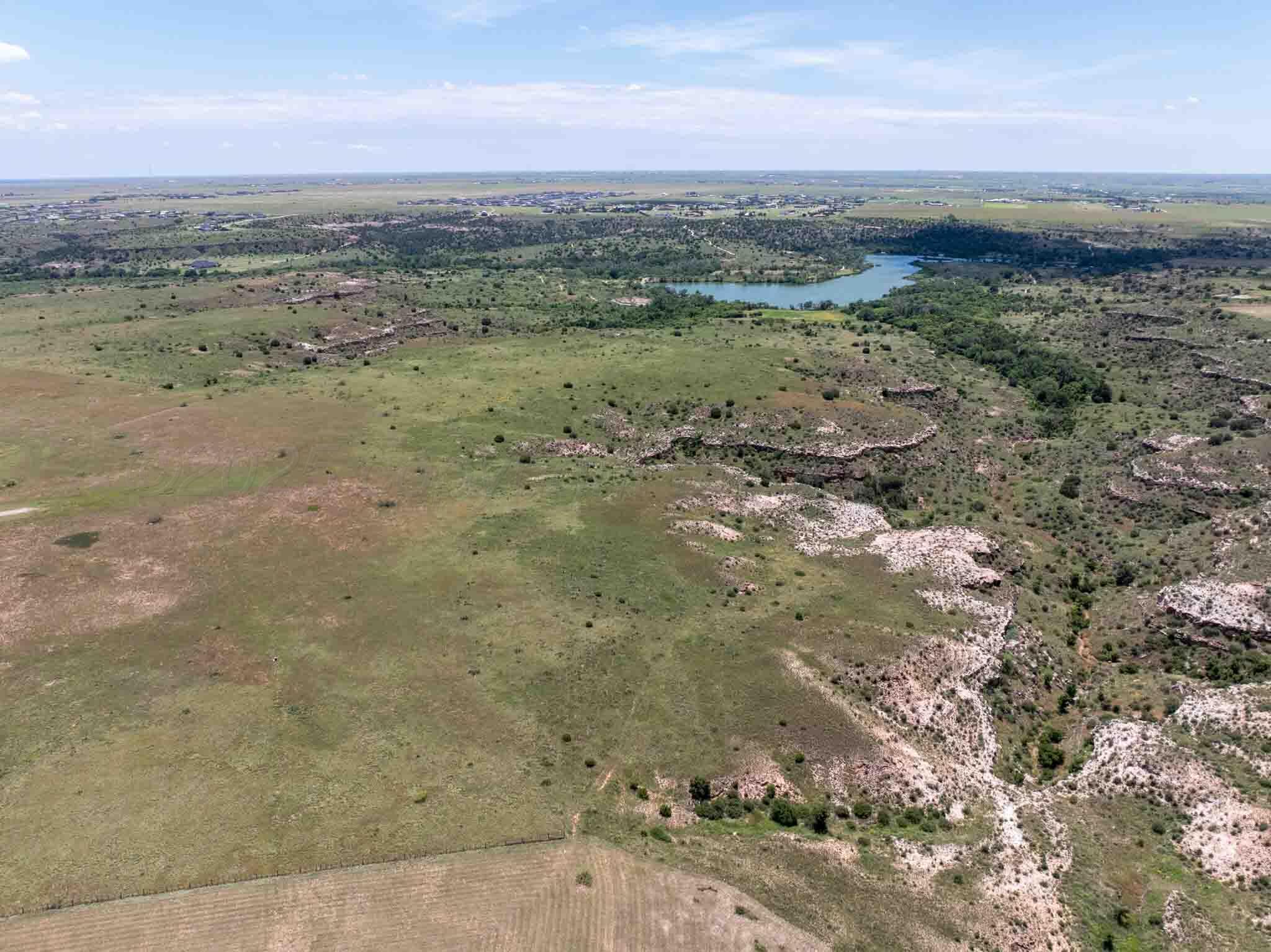 35.22 Jackson Ranch Road Canyon, TX 79015 - Photo 15 of 19 a view of a road with an ocean beach