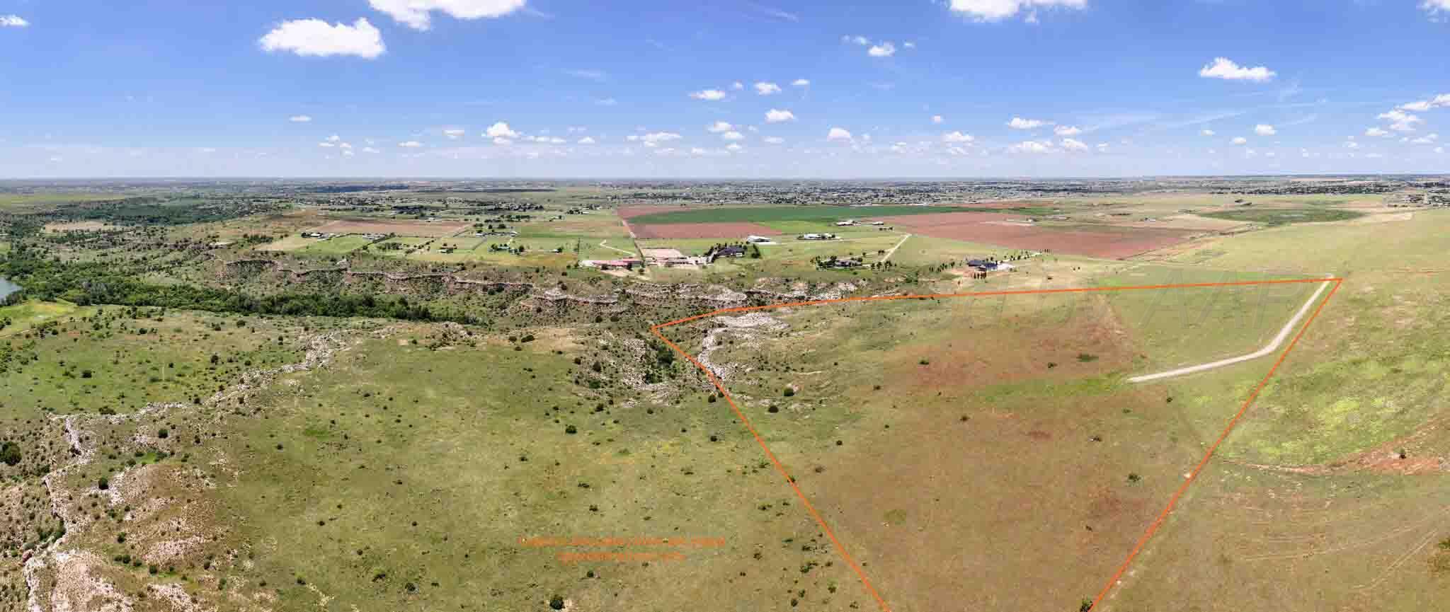 35.22 Jackson Ranch Road Canyon, TX 79015 - Photo 4 of 19 a view of an ocean and a yard