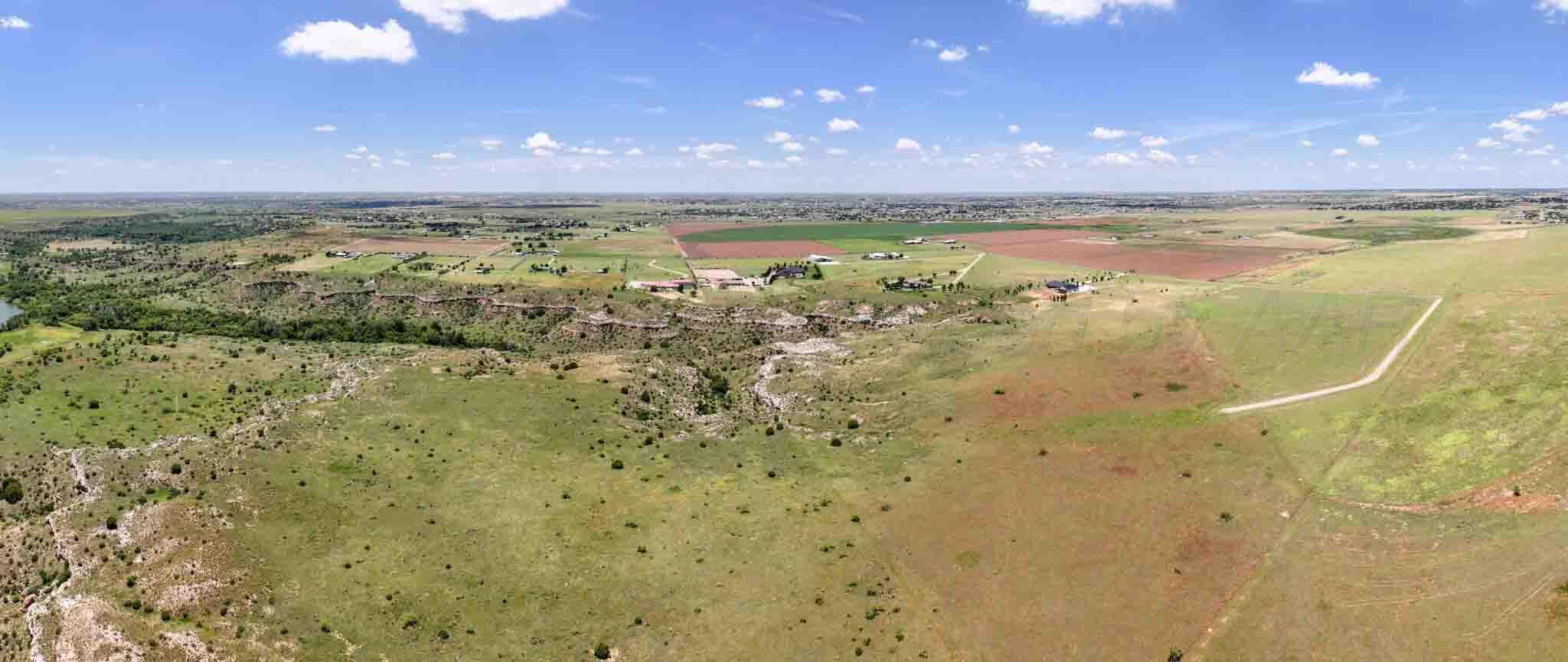 35.22 Jackson Ranch Road Canyon, TX 79015 - Photo 5 of 19 a view of an ocean and a yard