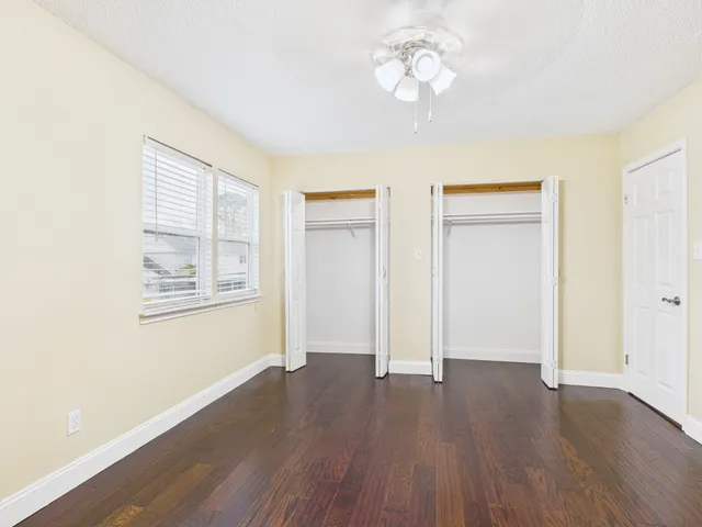 a bathroom with a shower and a toilet