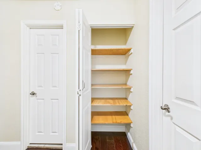 a view of outdoor space with wooden fence