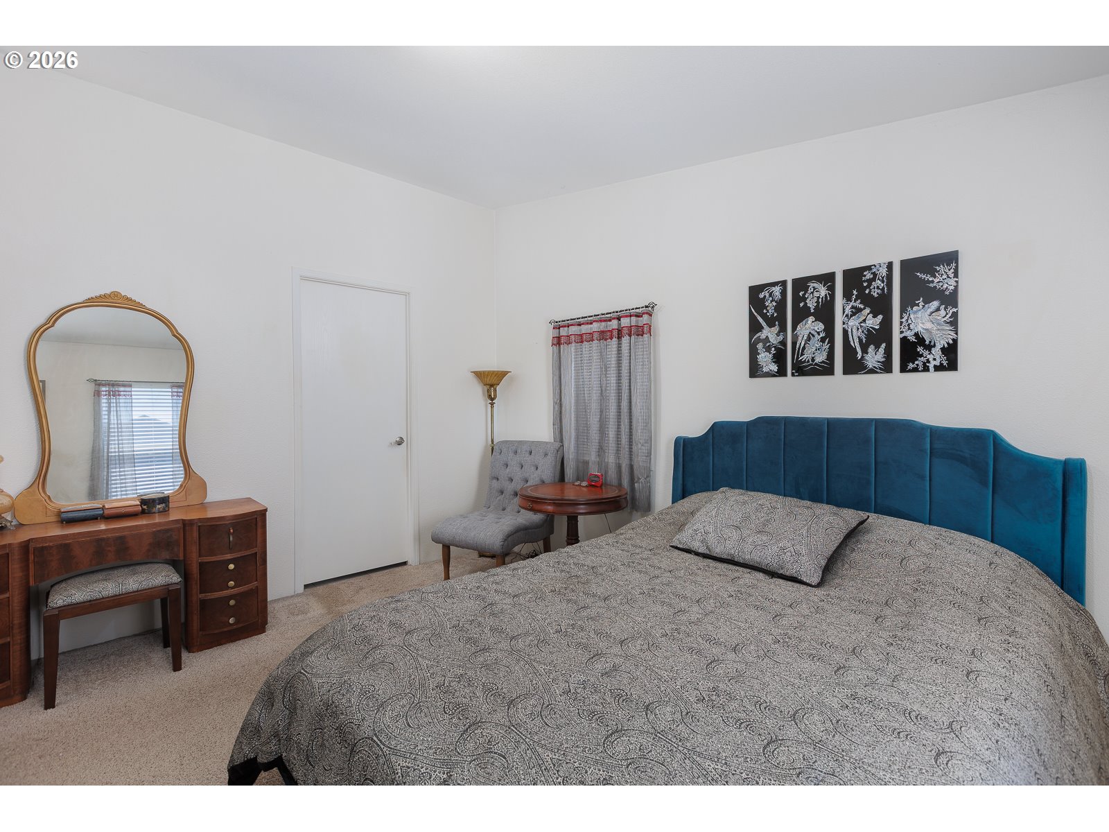 2018 Northwest Oceanic Loop Waldport, OR 97394 - Photo 16 of 35 a bedroom with a bed and a dresser