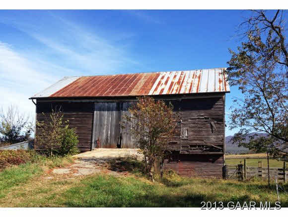 1044 Humbert Road Crimora, VA 24431 - Photo 11 of 21 a view of a house with a yard and garage