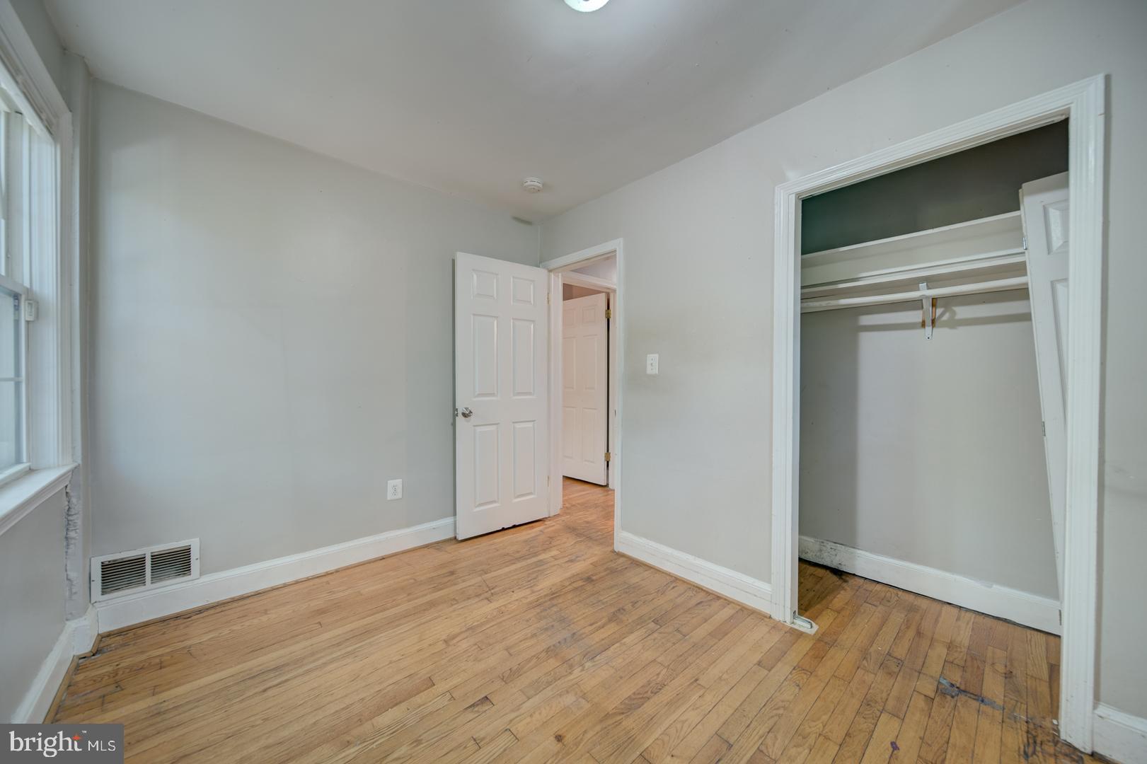802 Modoc Lane Oxon Hill, MD 20745 - Photo 18 of 34 a view of empty room with wooden floor