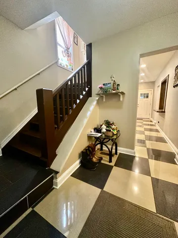 a view of a living room and dining room