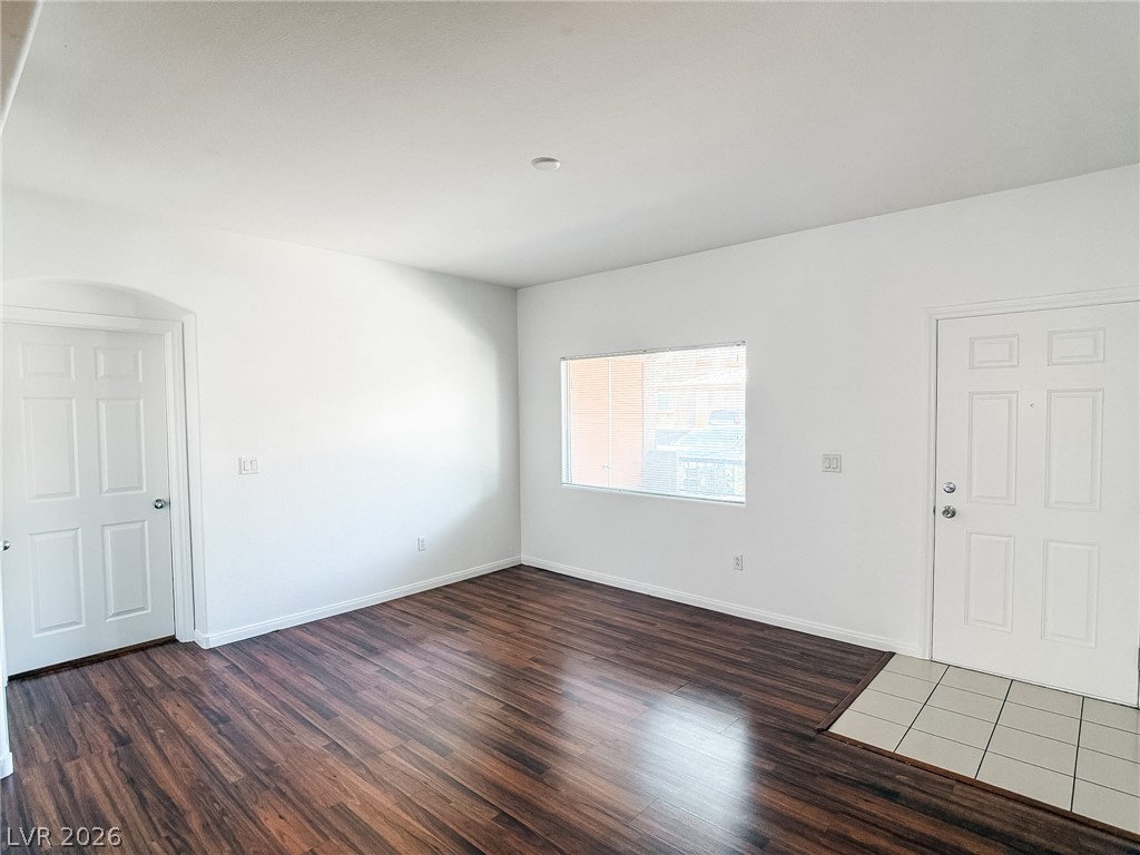 7701 West Robindale Road, Unit 110 Las Vegas, NV 89113 - Photo 3 of 21 Refined wood flooring enhances this inviting room, ready for your personalized touch.