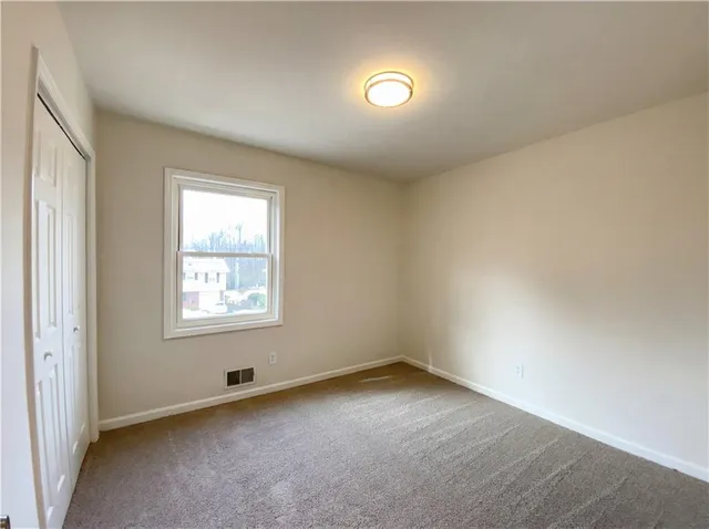 an empty room with a window