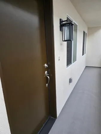 a view of a hallway with entryway