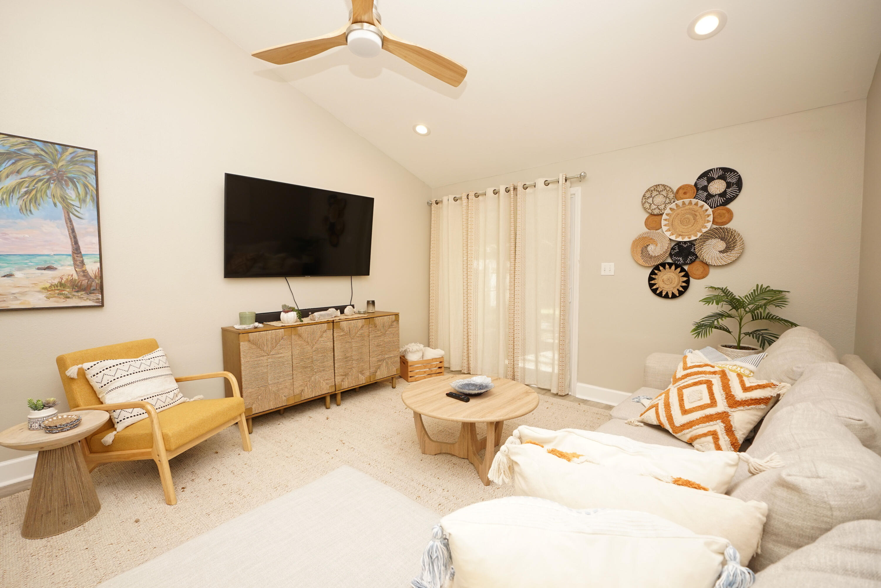 1503 Green Acres Boulevard, Unit E Fort Walton Beach, FL 32547 - Photo 13 of 25 a living room with furniture and a flat screen tv