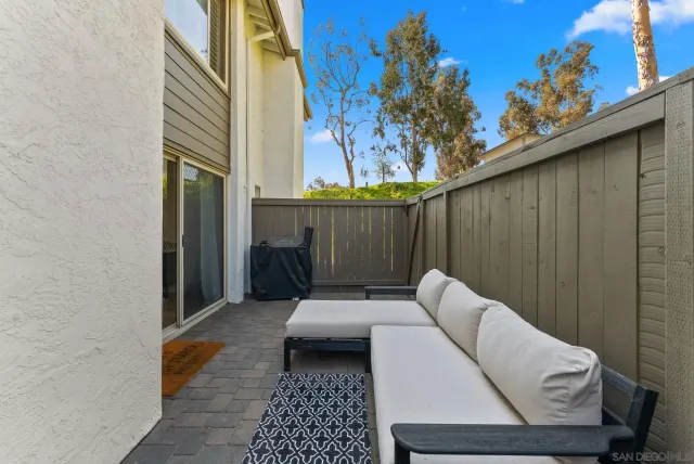 a view of balcony with furniture
