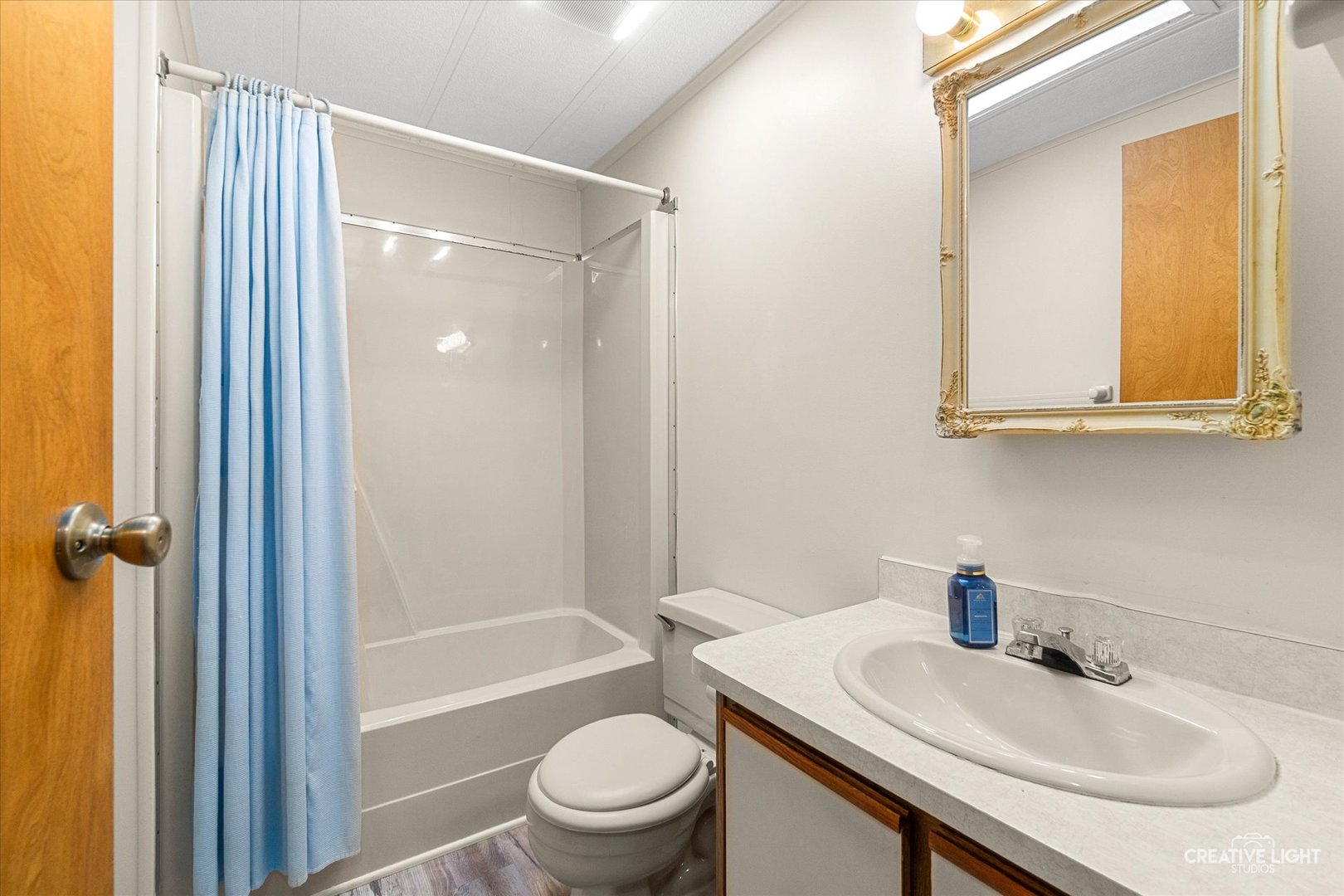 1122 Candida Road Elgin, IL 60123 - Photo 11 of 16 a bathroom with a sink toilet and shower