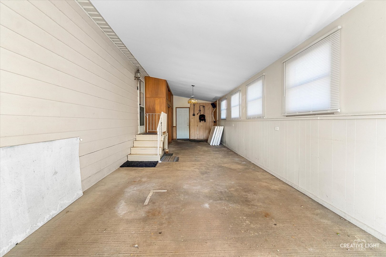 1122 Candida Road Elgin, IL 60123 - Photo 13 of 16 a view of an empty room and a window