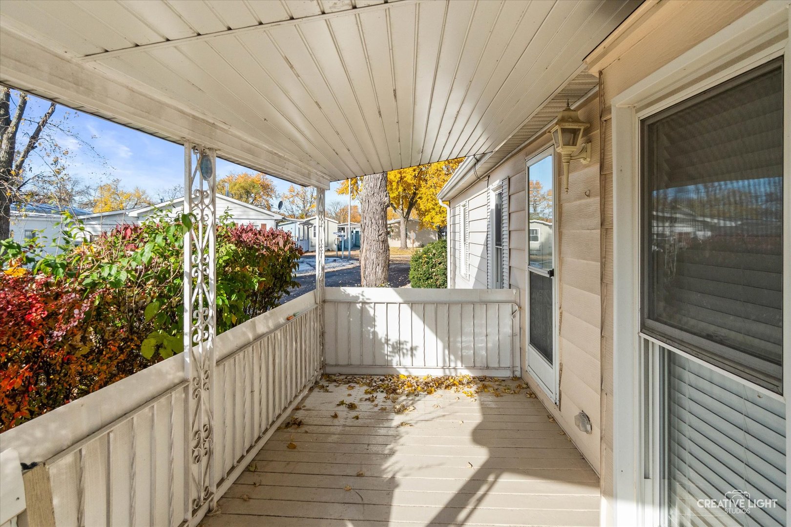 1122 Candida Road Elgin, IL 60123 - Photo 2 of 16 a view of porch with wooden floor